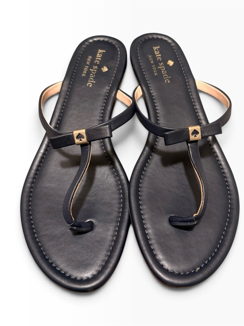 kate spade “Tatum” Navy Leather T‑Strap Sandals with Gold Logo Bow Accent Sz 9
